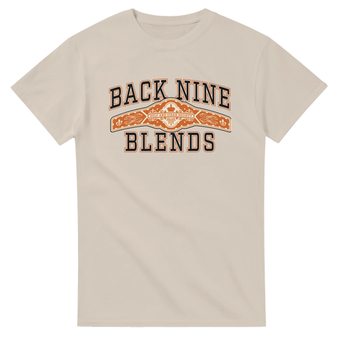 A sand tee with a cigar band graphic on the chest reading 'BACK NINE BLENDS' in black and orange.