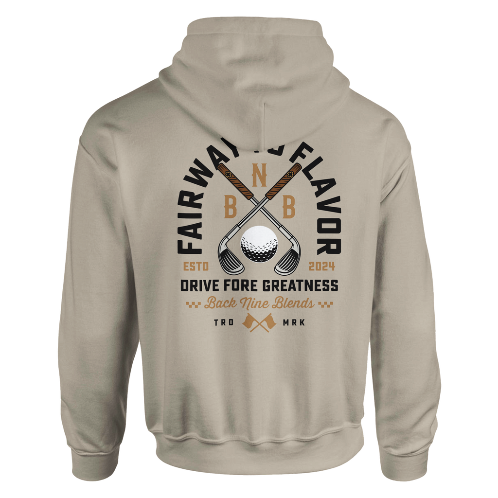 A sand hoodie featuring a bold graphic of crossed golf clubs and a golf ball, with arced black text 'FAIRWAY TO FLAVOR' above, and 'DRIVE FORE GREATNESS' below.